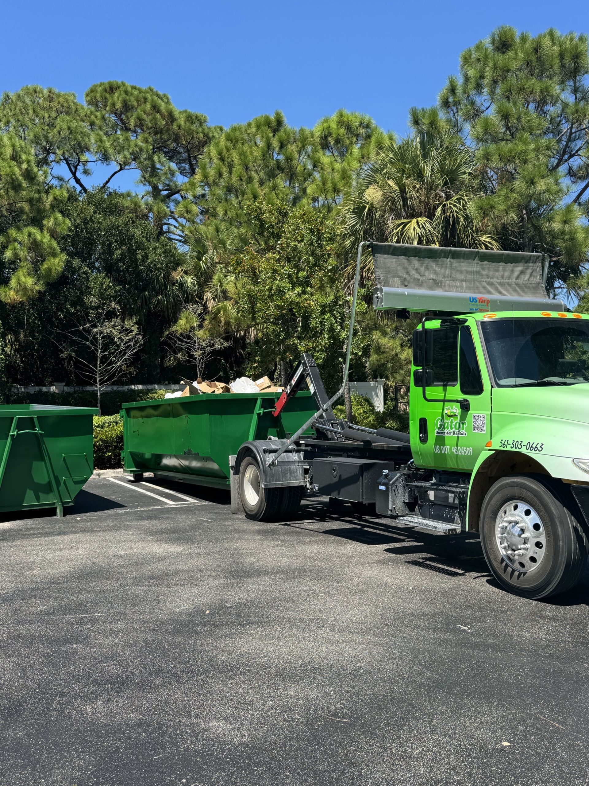 Roll-off dumpster rental in Palm Beach Gardens with driveway protection